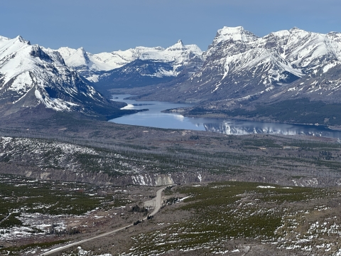 aerial view of mountains and a large lake