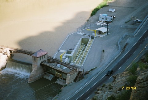 Aerial view of a dam showing the fish ladder 