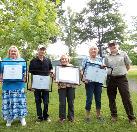 Volunteers with presidential volunteer awards