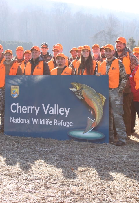 Participants in the Field to Fork mentored rifle deer hunt pose for a group photo at Cherry Valley National Wildlife Refuge in December 2024. 