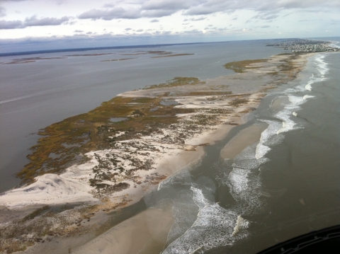 barrier island covered with water and sand 