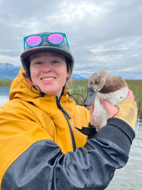 person holding a duck