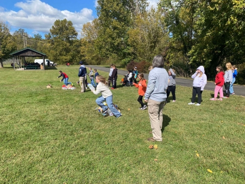 Kids running in grass 