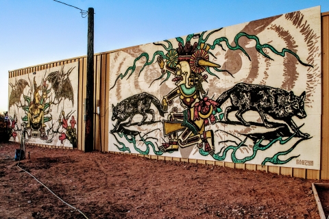 Image of 2 murals painted on a wall