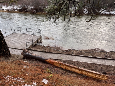 the LNFH fishing platform and trail show minor rail damage but are free from all woody debris after work crew clears it