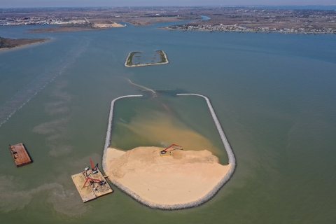 Construction of Dickinson Bay Island 2 with Dickinson Bay Island 1 in the background.