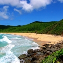 Blue waters lapping up on a beach at Culebra NWR