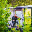 A pianist performs with a string quartet at a national wildlife refuge