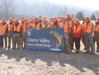 Participants in the Field to Fork mentored rifle deer hunt pose for a group photo at Cherry Valley National Wildlife Refuge in December 2024. 