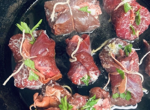 Pre-cooked elk braciole wrapped in twine